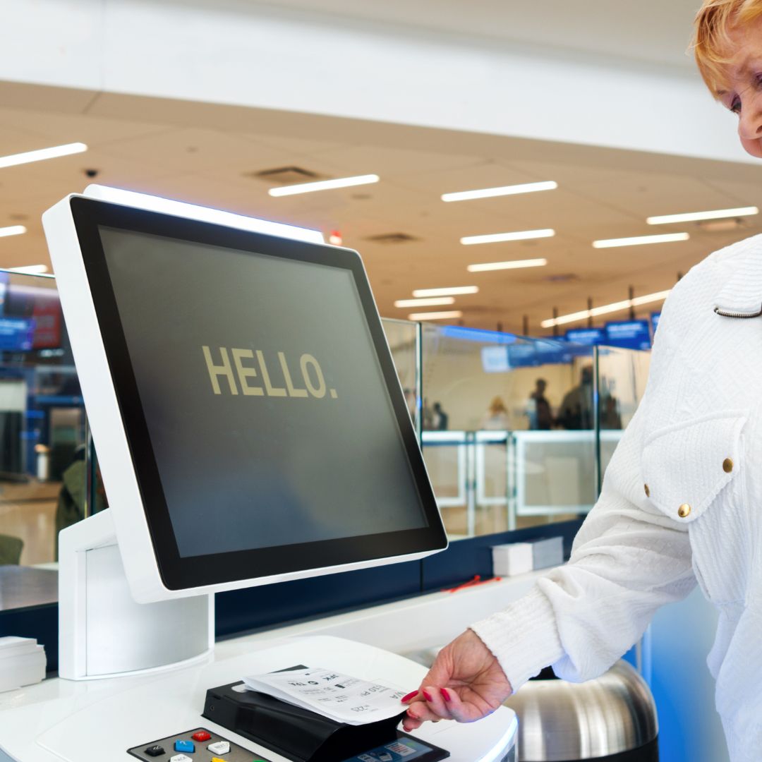 woman using a kiosk
