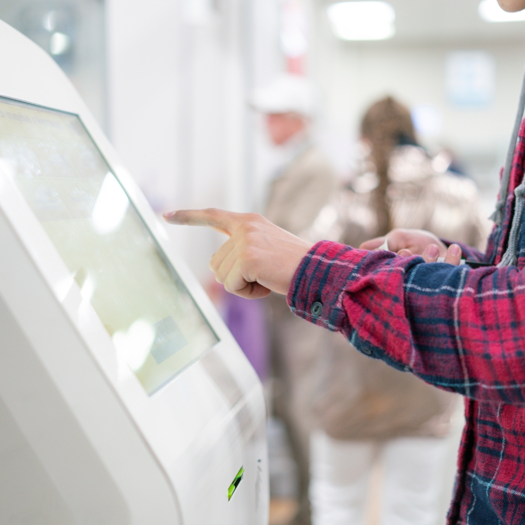 man using kiosk