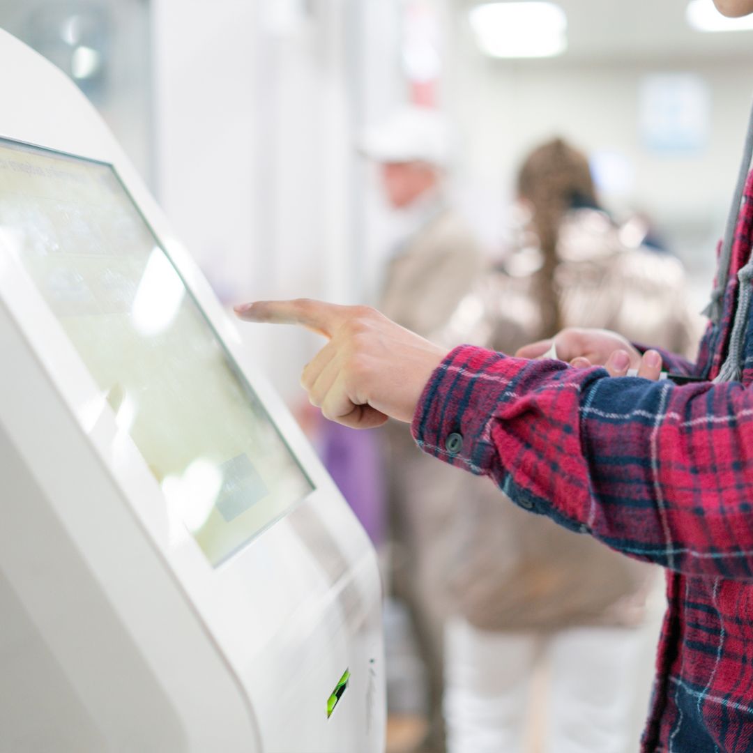 person at kiosk