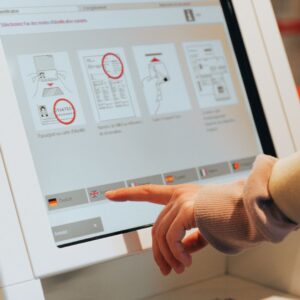 hand using kiosk
